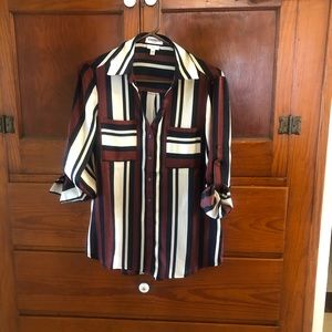 Long sleeved blouse - arms are pinned up to sleeve